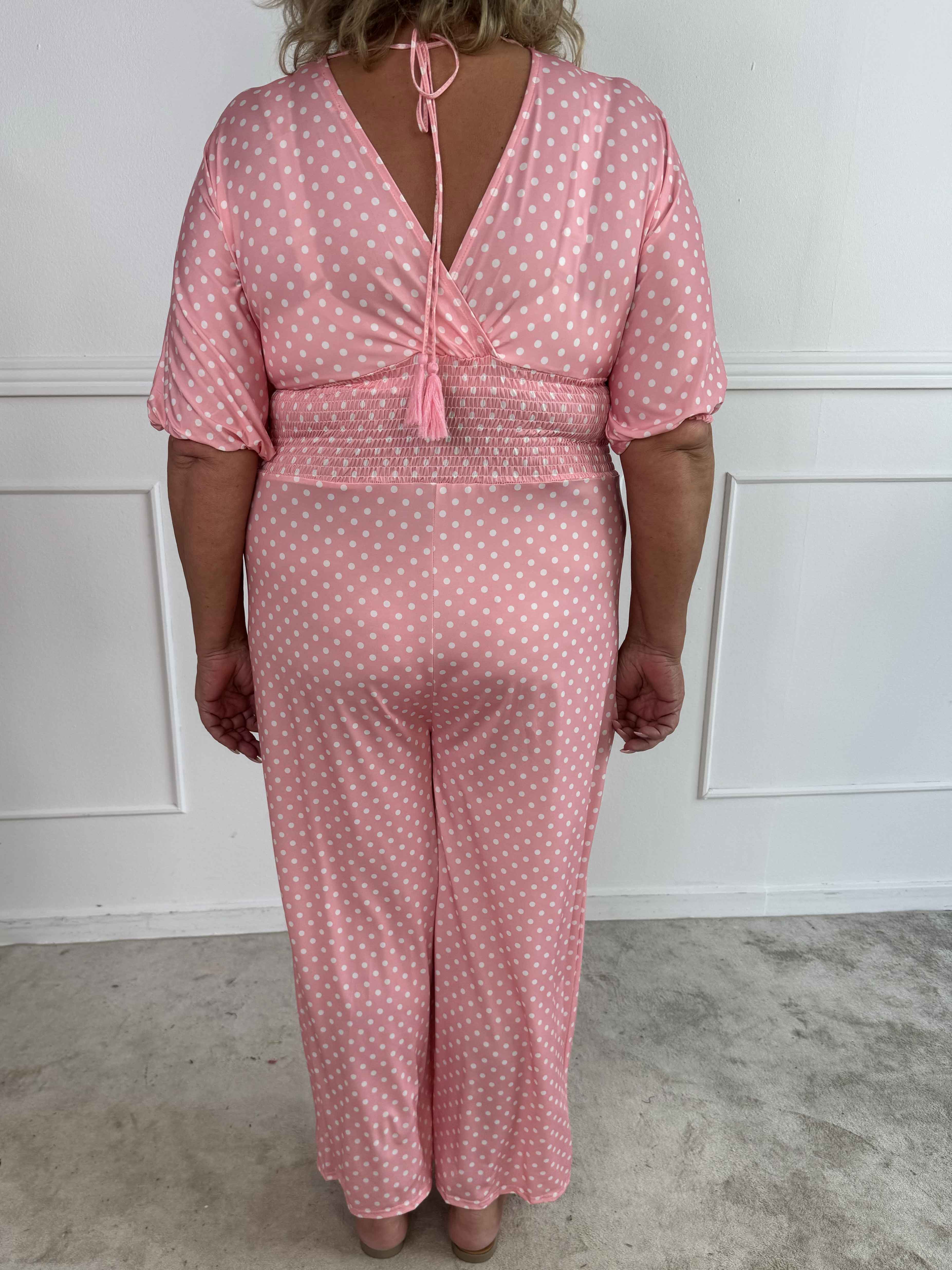 Grace - Stretchig plus size jumpsuit med vita prickar
